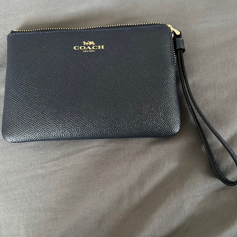 Authentic. Navy Coach Wristlet.